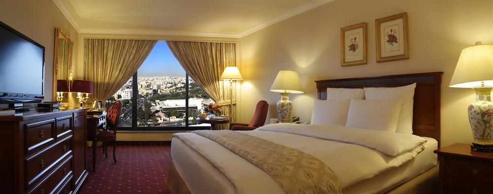 Regency Palace Amman Exteriör bild A bedroom at the Grand Hotel