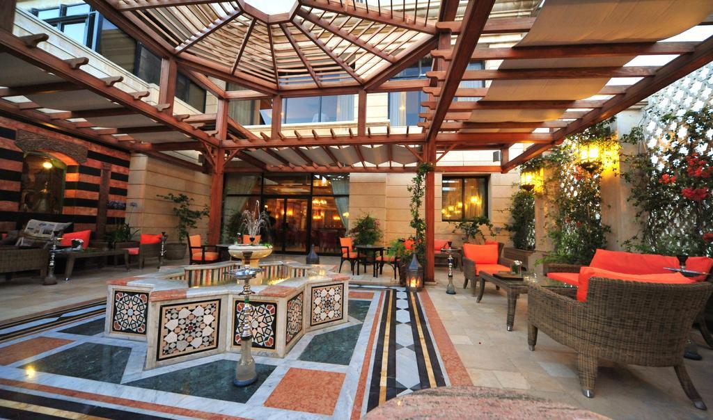 Regency Palace Amman Exteriör bild The hotel's lobby
